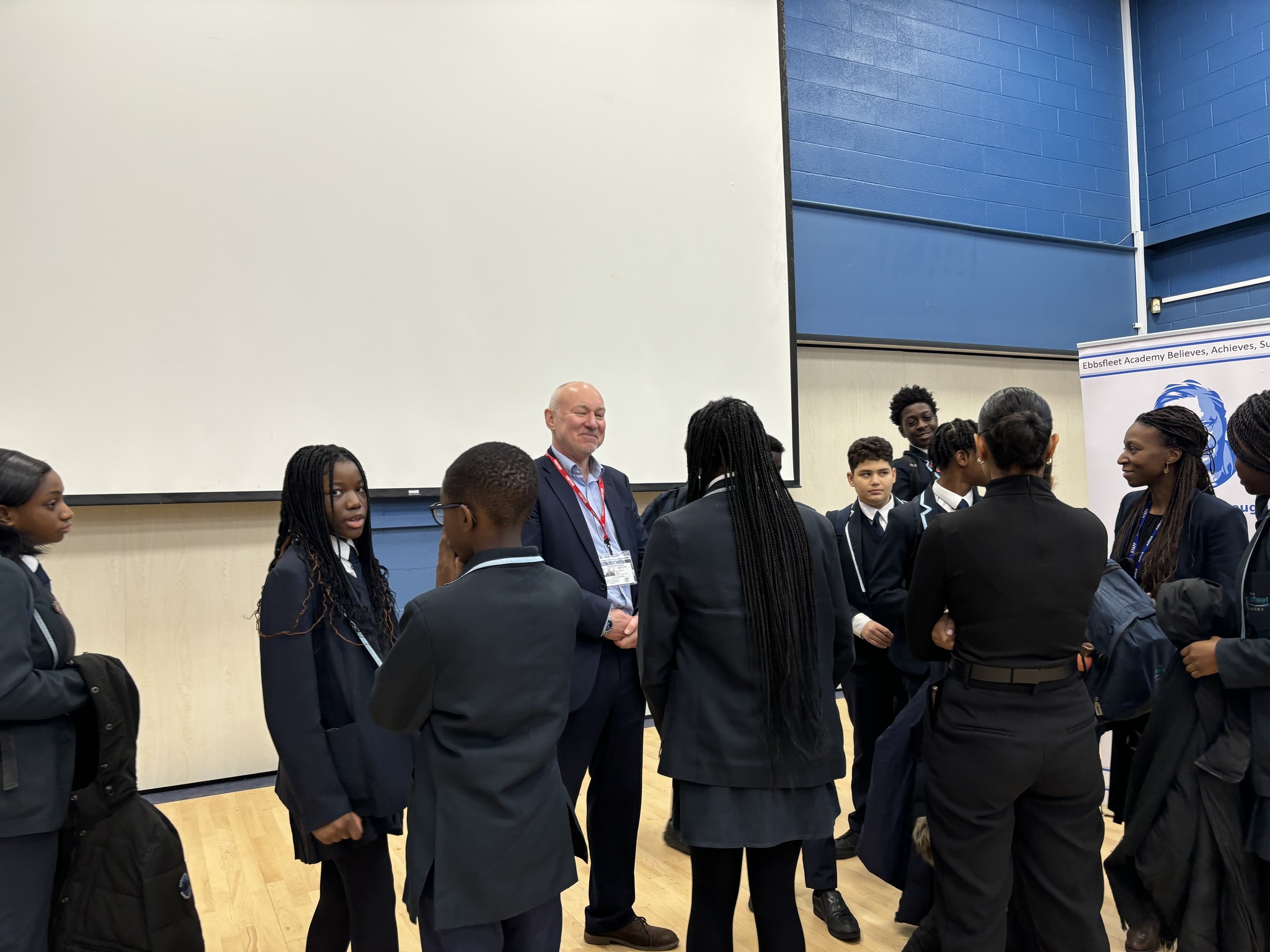 Jim Dickson speaking to a group of students