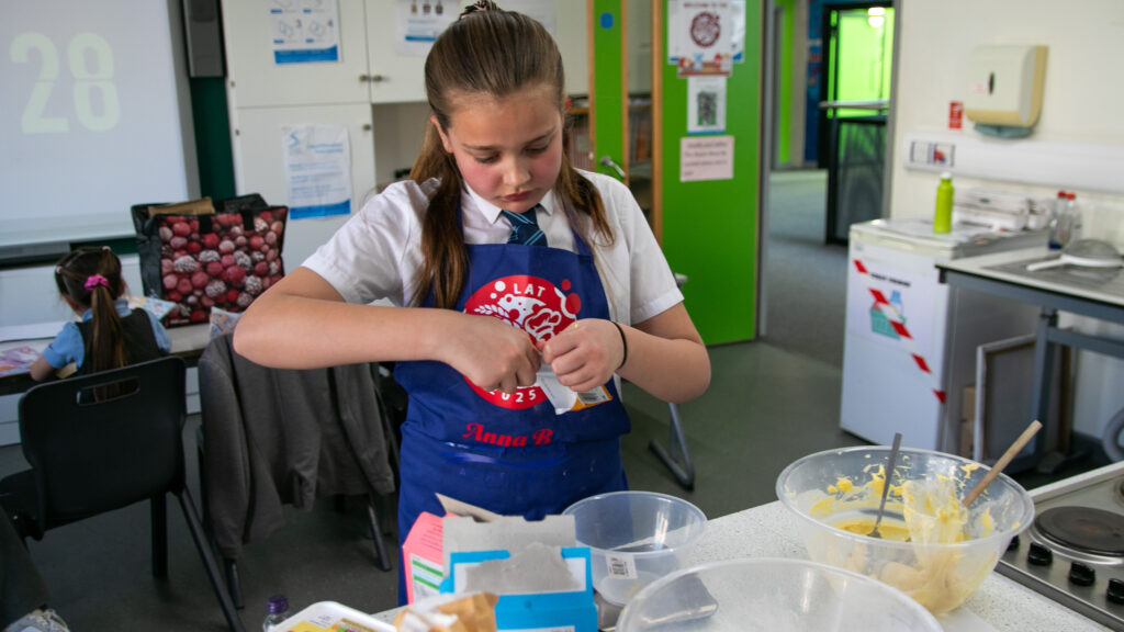 Anna baking her biscuits