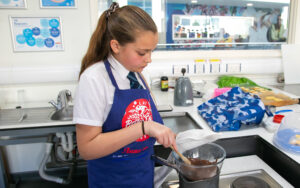 Anna baking her biscuits and melting chocolate