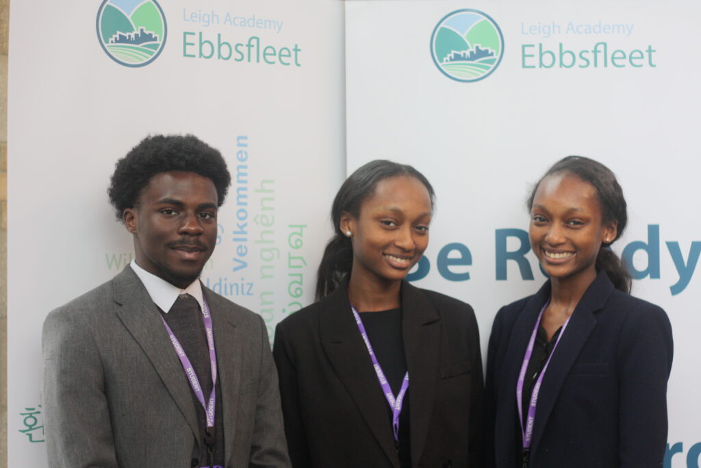 Pictured are the three head students at Leigh Academy Ebbsfleet in front of an academy banner